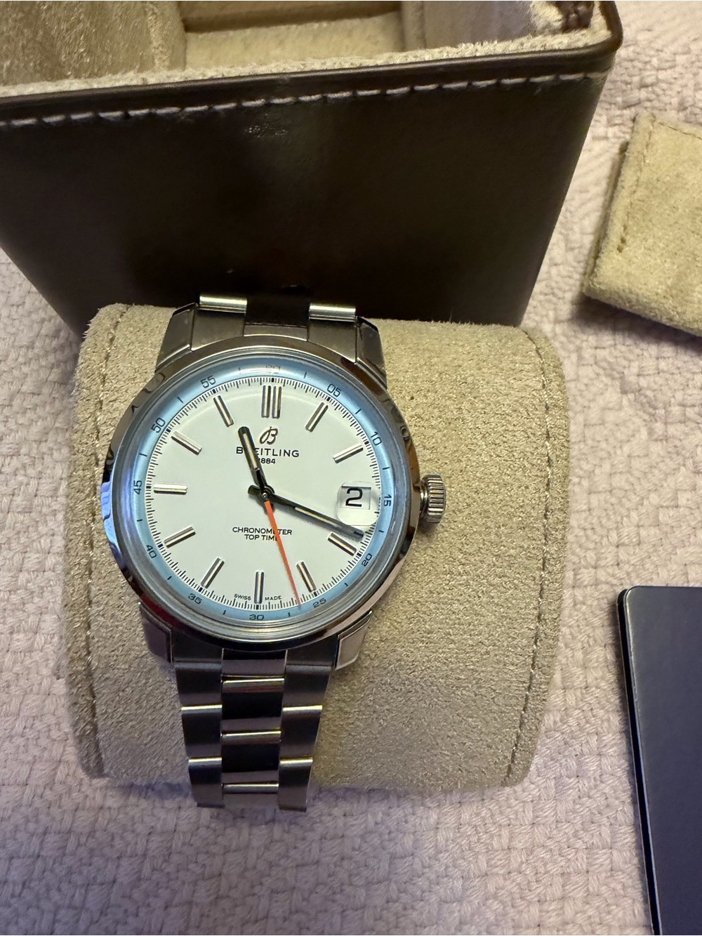 Breitling Men’s Steel Watch with White Dial and Orange Accent